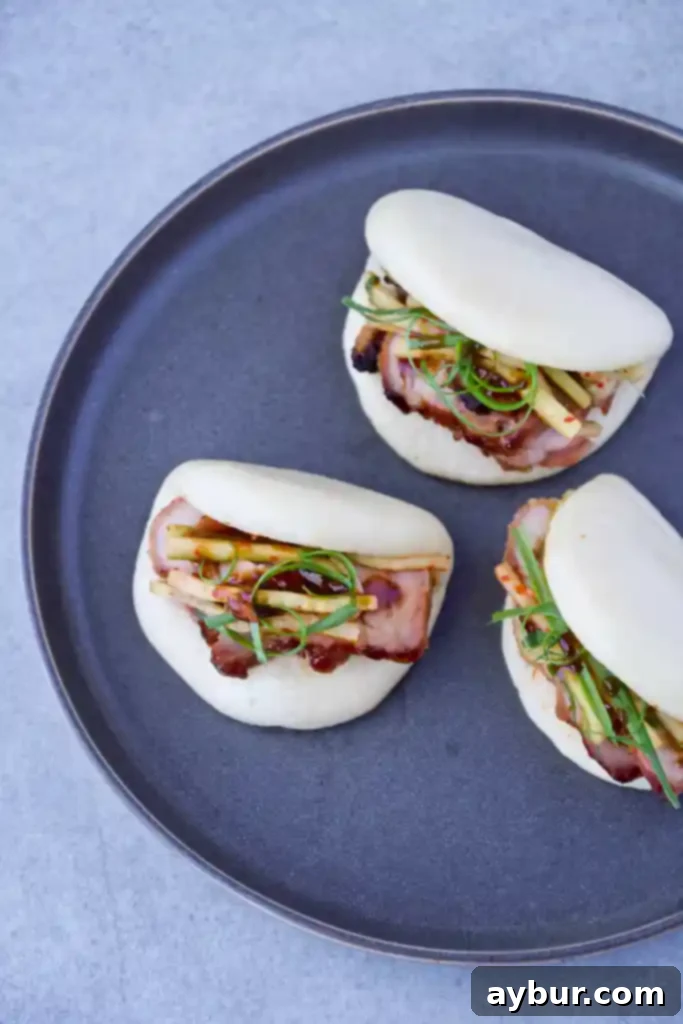 Fluffy Steamed Buns 2 Fluffy homemade Bao Buns filled with roasted pork belly