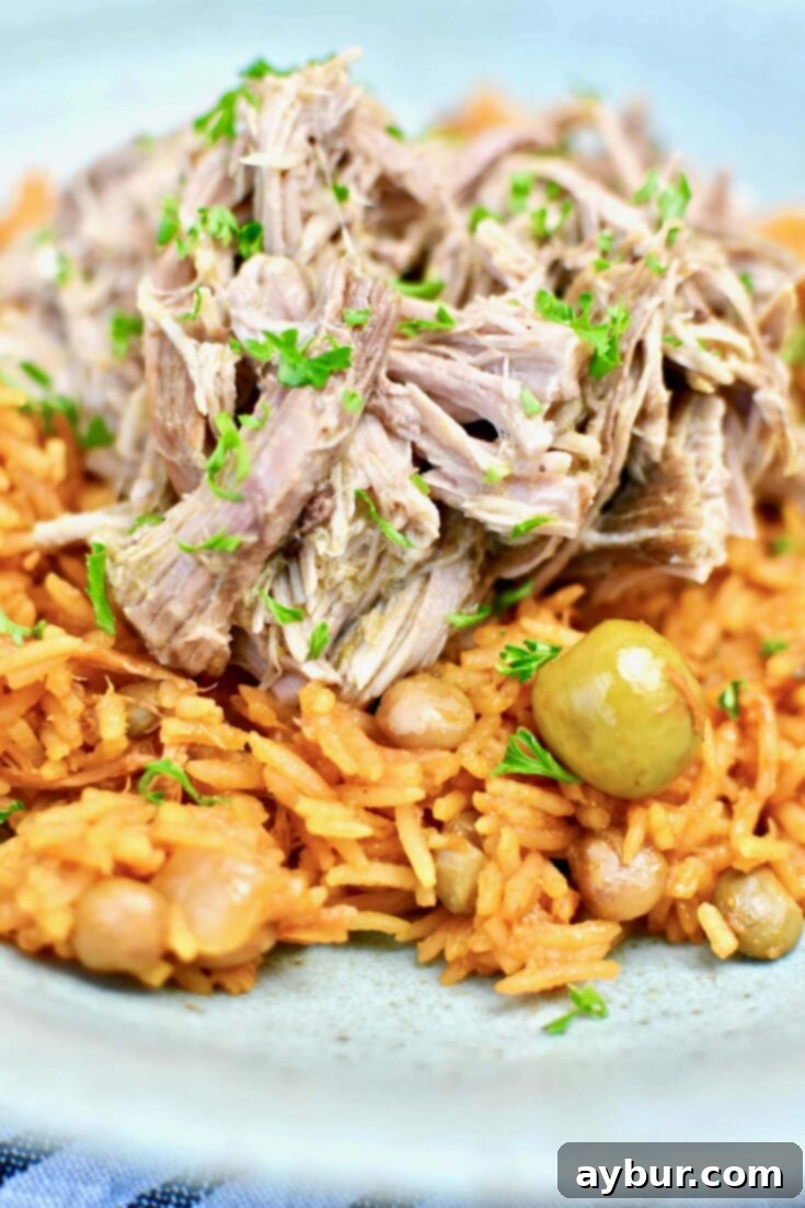 A beautifully presented bowl of Arroz con Gandules, perfect for pinning.