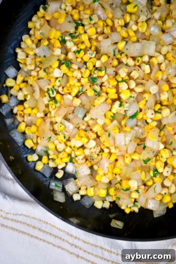 Close-up of Mexican Street Corn Topper with cotija cheese and cilantro
