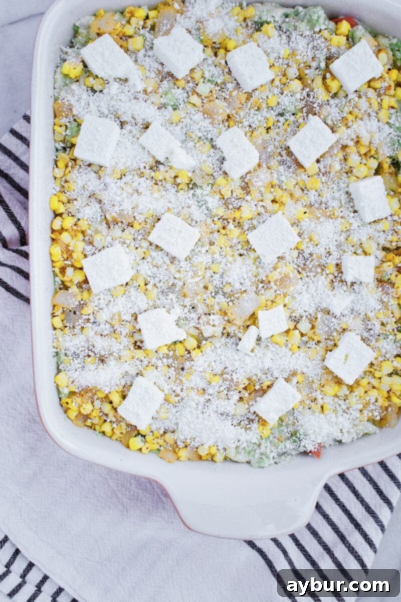 Creamy Chicken Enchilada Casserole baking in the oven