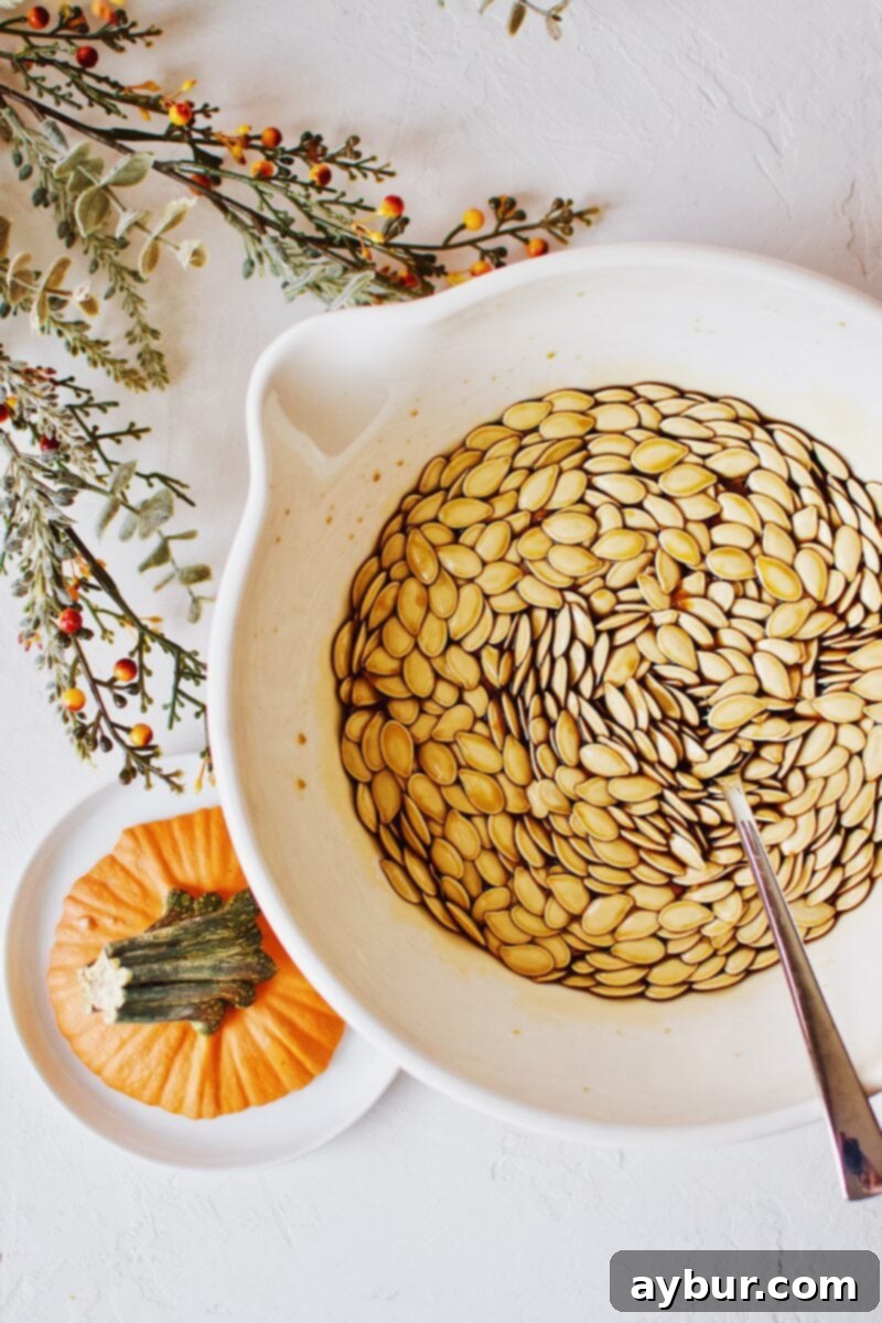 Soy-Glazed Pumpkin Seeds 6 Pumpkin seeds gently soaking in soy sauce, absorbing the savory flavors before roasting.