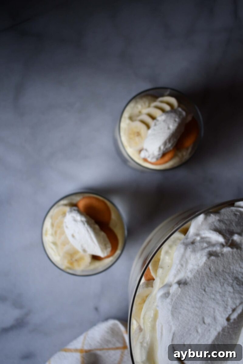 Aunt Opal's Banana Pudding Perfection in Every Spoonful 4 Homemade Aunt Opal's Banana Pudding prepared by KendellKreations, featuring fresh bananas and luscious whipped cream from the Magnolia Table Cookbook