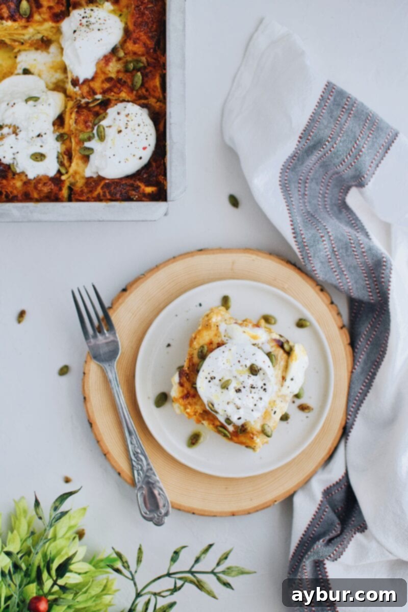 Pumpkin Beer Cheese Lasagna fresh out of the oven, golden brown and bubbly, ready to be served