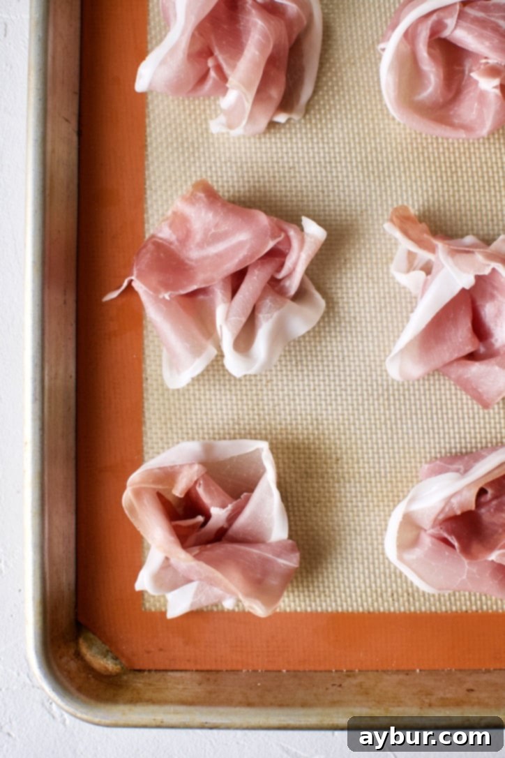 Plant-Based Creamy Potato Soup 3 Prosciutto rolled into roses, before baking.