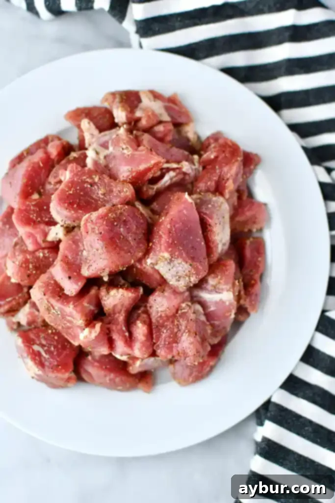 Seasoned pork tenderloin ready for cooking