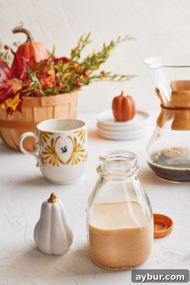 Pumpkin Spice Creamer 5 A cozy mug of coffee with homemade pumpkin spice creamer, perfect for a fall morning